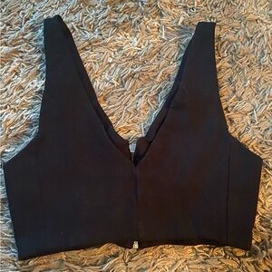 Zara woman top 
cropped 
deep v 
medium
Black
Zipper can be worn in front/back